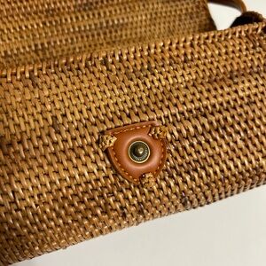 Handwoven cross body bag with leather straps